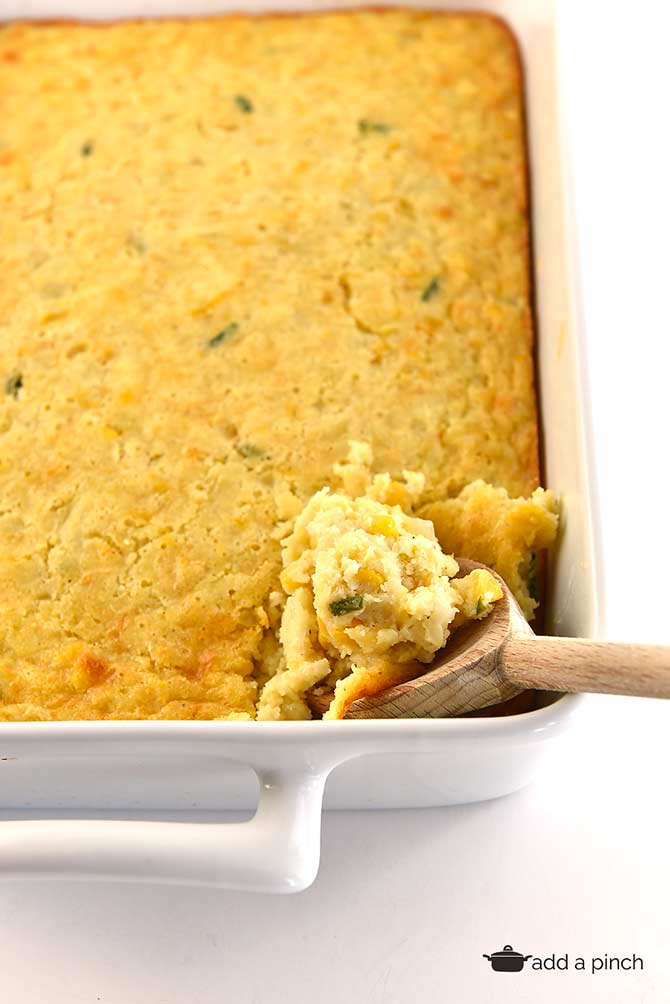 Corn casserole makes a comforting classic casserole! Made of creamed and whole corn, this corn casserole comes together quickly and makes a favorite side dish! // addapinch.com