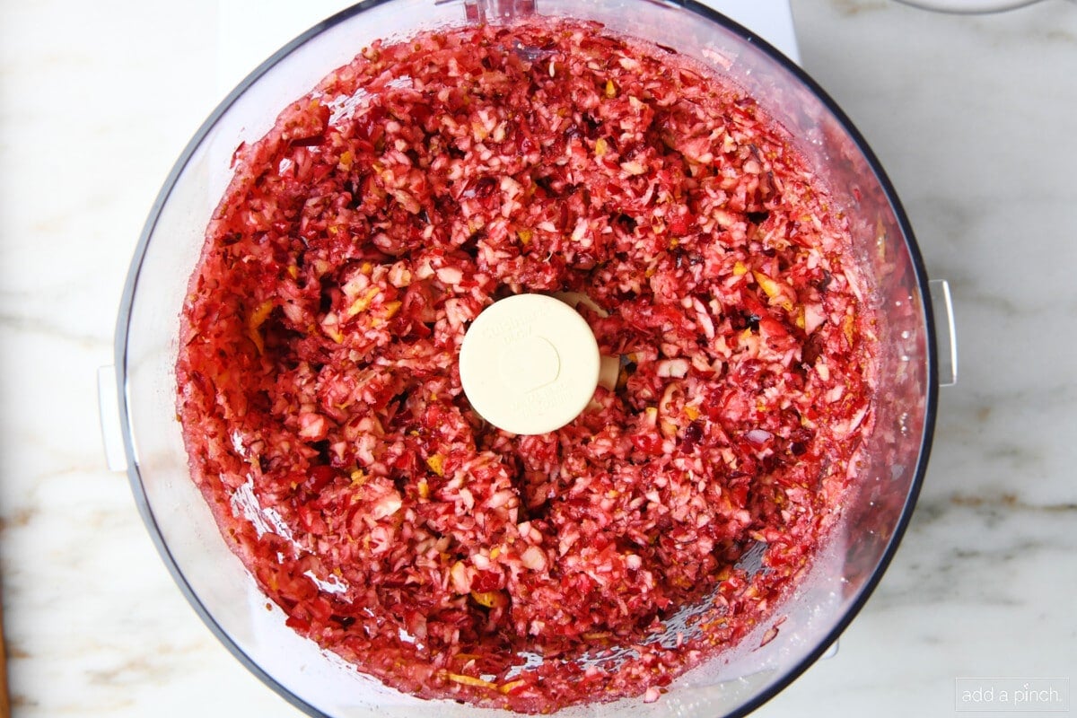 Pulsed fresh cranberries, orange slices, and sugar in a food processor.