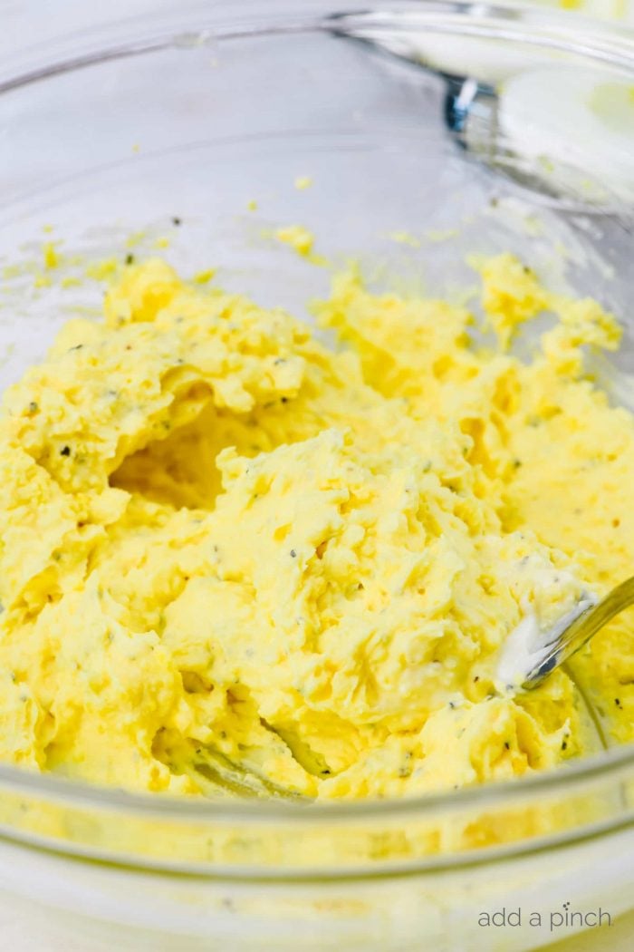 Photograph of egg filling of egg yolks, mayonnaise, salt and black pepper.