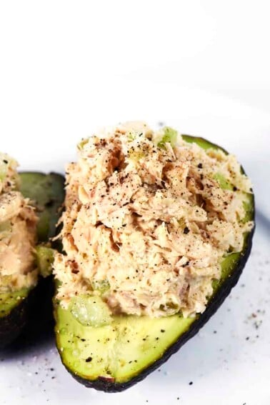 Tuna Salad Recipe - This Tuna Salad recipe makes a delicious, flavorful recipe perfect for lunch or a light supper! Stuffed into an avocado, as a sandwich or served on a lettuce leaf! // addapinch.com